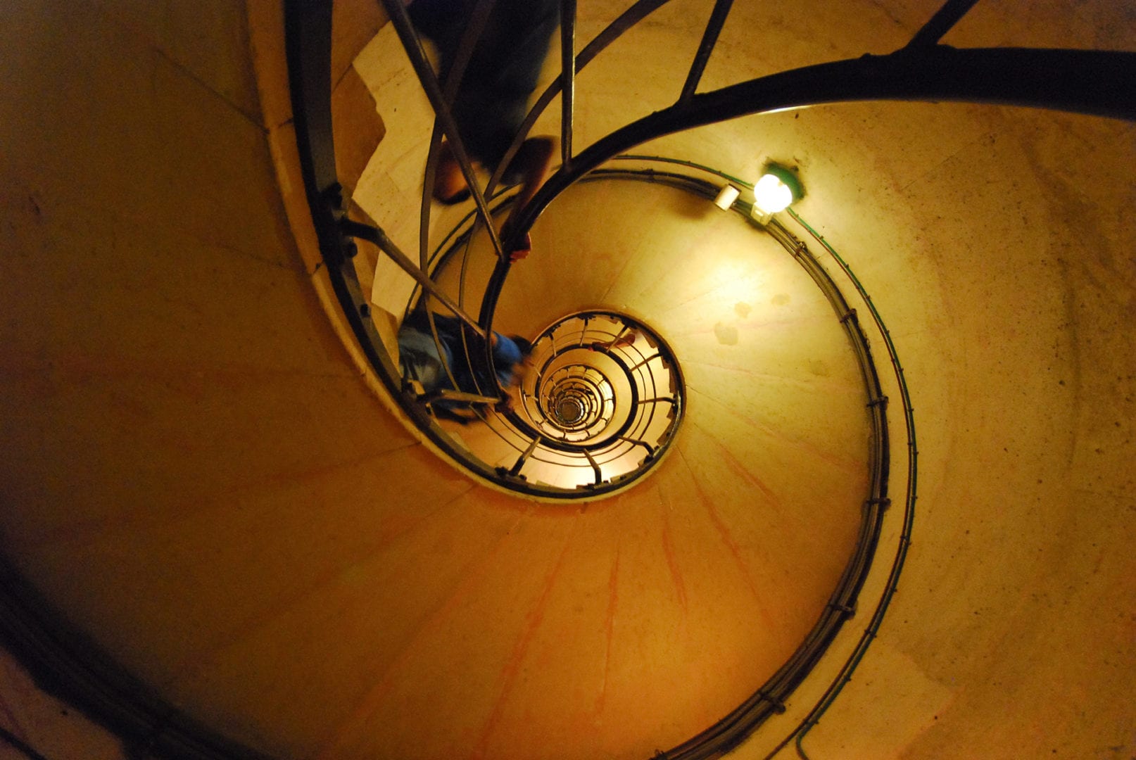 Up the spiral staircase inside the Arc de Triomph